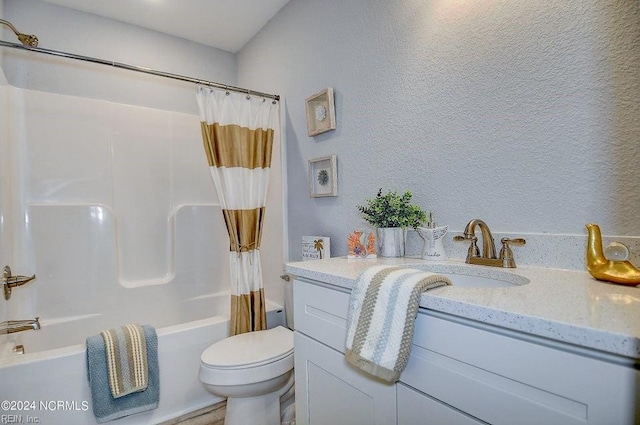 full bathroom with vanity, toilet, and shower / bath combo