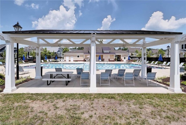 view of patio with a community pool