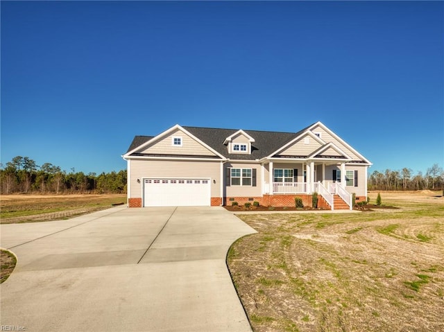 craftsman-style home with a garage, a front yard, and covered porch