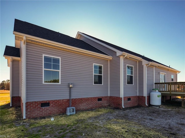 view of home's exterior featuring a deck