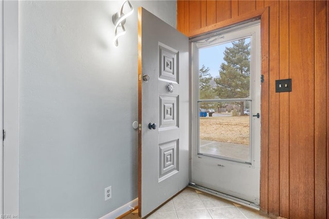 entryway featuring light tile patterned flooring