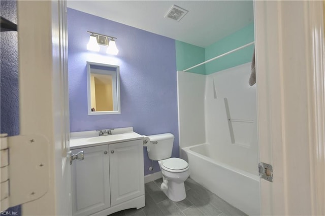 full bathroom featuring shower / bath combination, vanity, tile patterned floors, and toilet