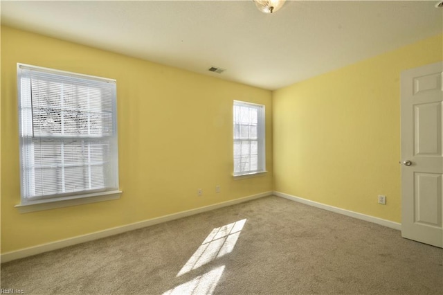 view of carpeted spare room