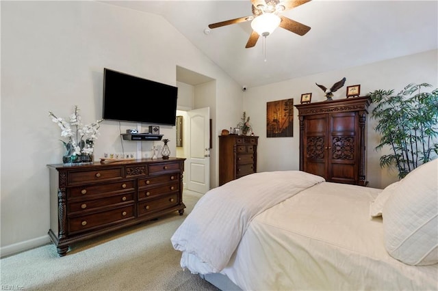 carpeted bedroom with lofted ceiling and ceiling fan