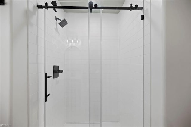 details with an enclosed shower