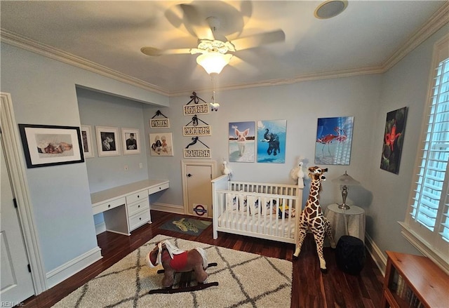 bedroom featuring crown molding, dark wood-type flooring, and built in desk