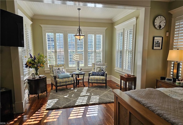 bedroom with dark hardwood / wood-style flooring and crown molding