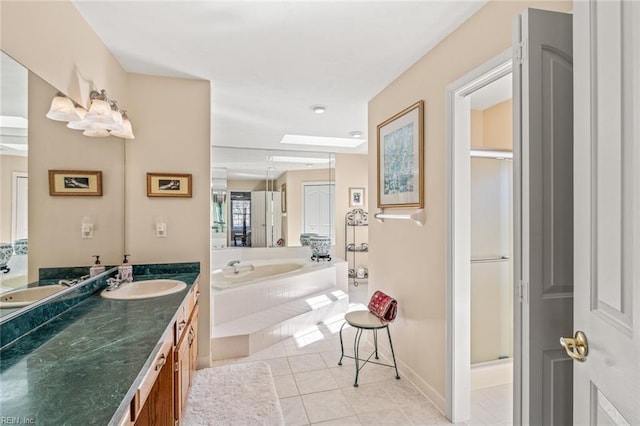 bathroom with vanity, plus walk in shower, and tile patterned flooring