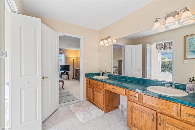 bathroom with vanity and tile patterned flooring