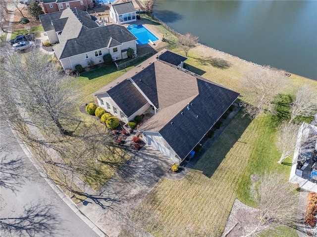 drone / aerial view with a water view