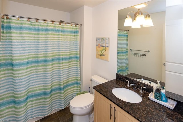 bathroom with toilet, a notable chandelier, a shower with curtain, tile patterned floors, and vanity