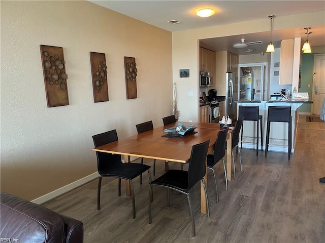 dining room featuring hardwood / wood-style floors