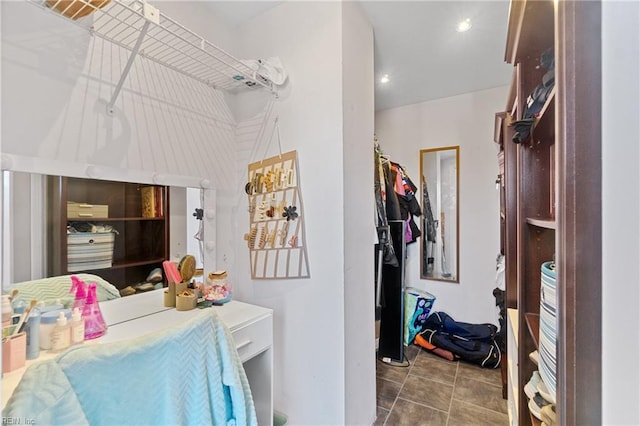 walk in closet featuring tile patterned floors