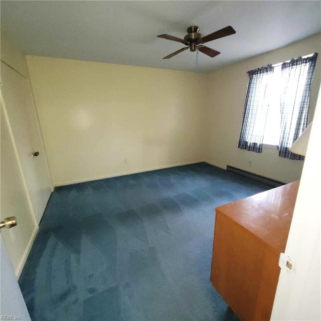 unfurnished bedroom with baseboards, a ceiling fan, and carpet flooring