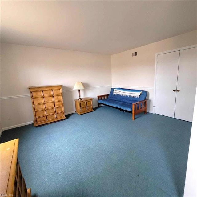 bedroom with carpet floors and visible vents