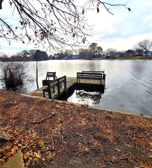 view of dock with a water view