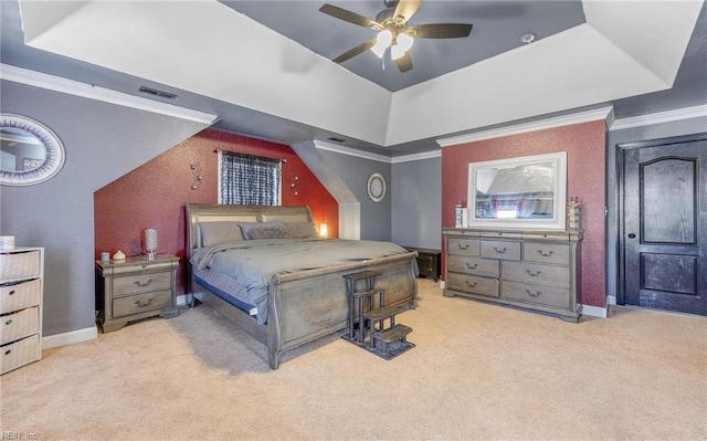 bedroom featuring crown molding, ceiling fan, light carpet, vaulted ceiling, and a raised ceiling