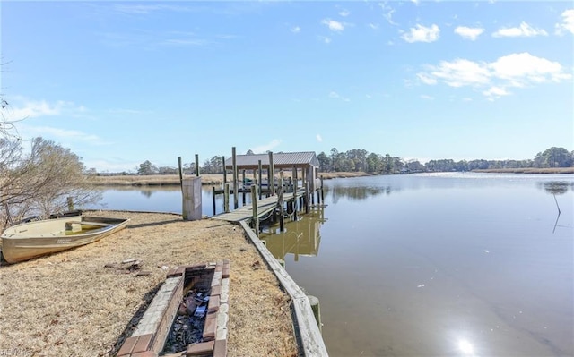 dock area featuring a water view