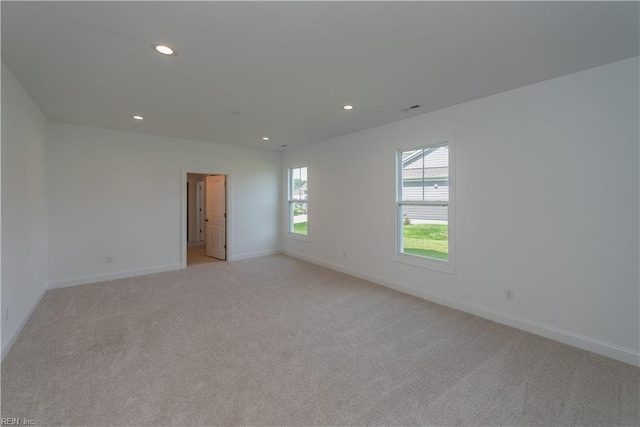view of carpeted spare room