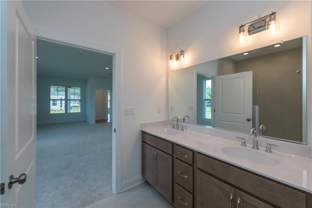 bathroom with vanity and tile patterned floors