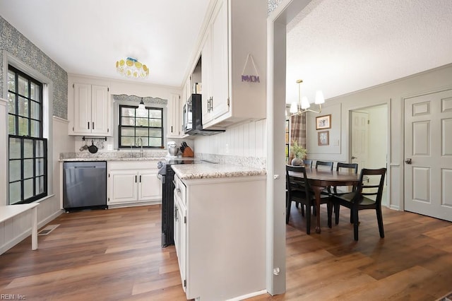 kitchen with dishwashing machine, sink, white cabinetry, electric range oven, and wood-type flooring