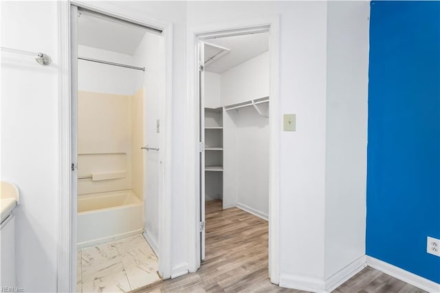 107 Marshall Way Unit J, Williamsburg, VA 23185 - full bathroom with tub / shower combination, baseboards, and a walk in closet