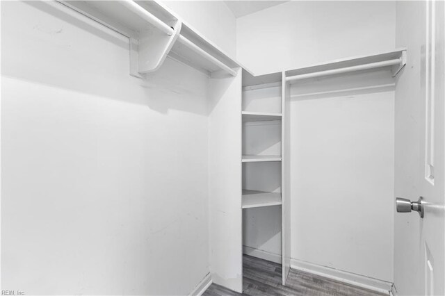 107 Marshall Way Unit J, Williamsburg, VA 23185 - spacious closet with dark wood-style floors