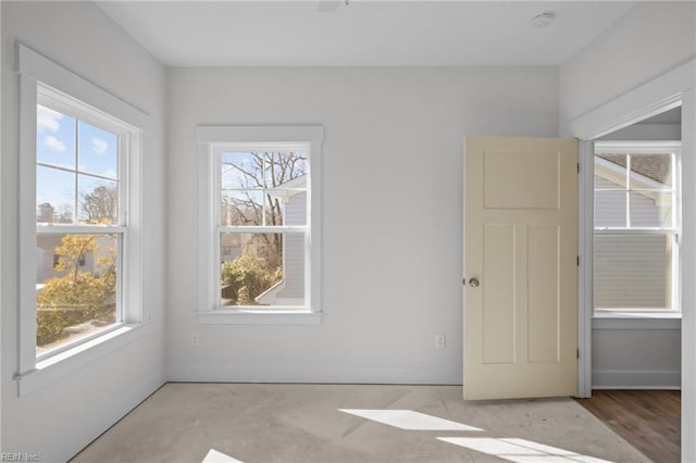 empty room featuring a healthy amount of sunlight