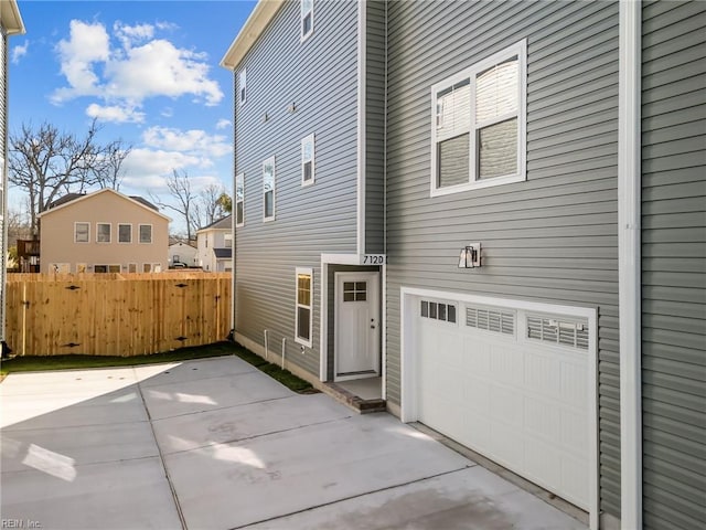 view of home's exterior with a garage