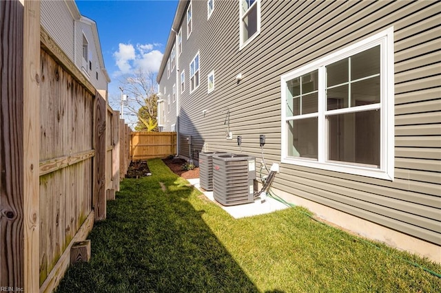 view of yard featuring central AC unit