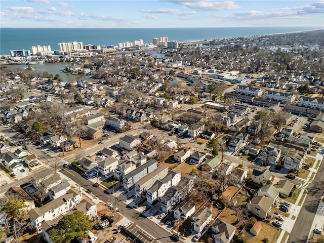 drone / aerial view with a water view