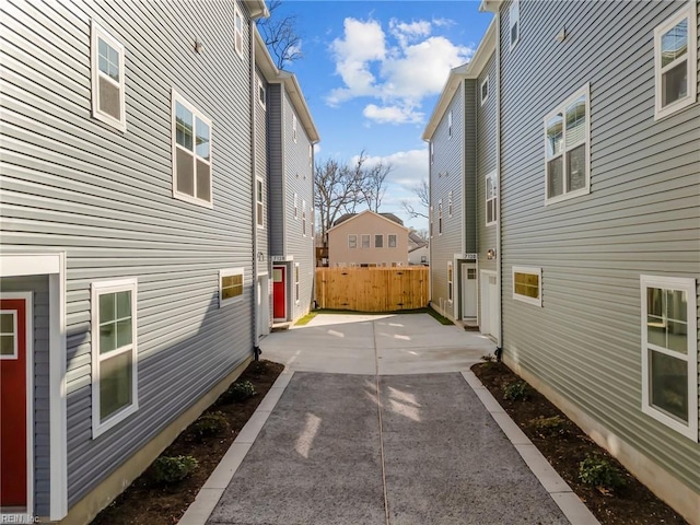 view of side of property featuring a patio area