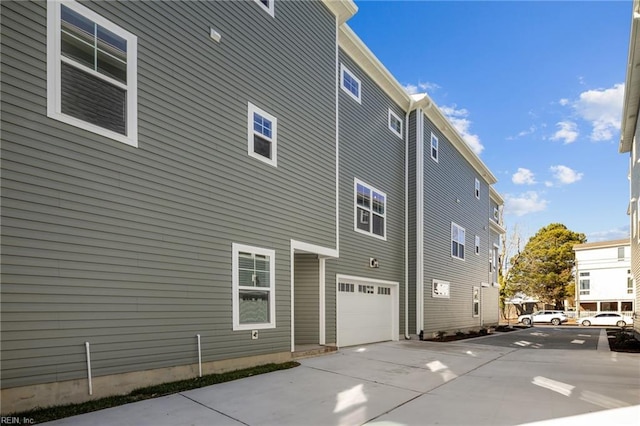 view of home's exterior featuring a garage