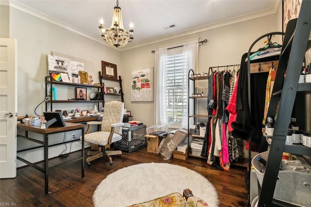 living area featuring ornamental molding, dark wood-type flooring, and a notable chandelier