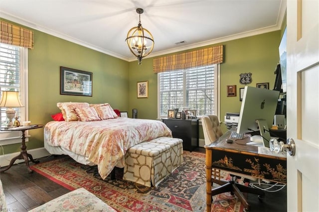 bedroom with crown molding, dark wood-type flooring, and a notable chandelier