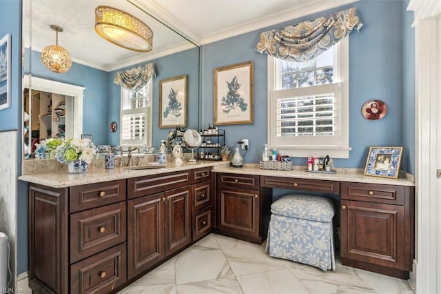 bathroom with vanity and ornamental molding