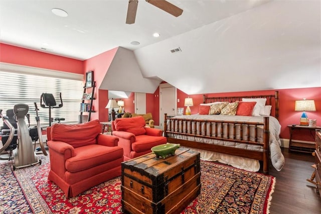 bedroom featuring lofted ceiling, hardwood / wood-style flooring, and ceiling fan