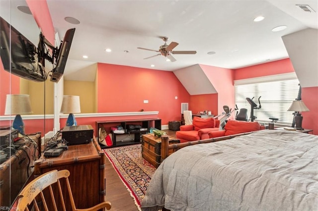 bedroom with lofted ceiling and dark hardwood / wood-style flooring