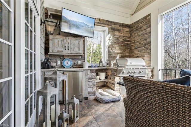 view of patio featuring exterior kitchen