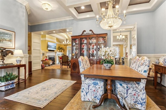 dining room featuring coffered ceiling, dark hardwood / wood-style floors, and a notable chandelier