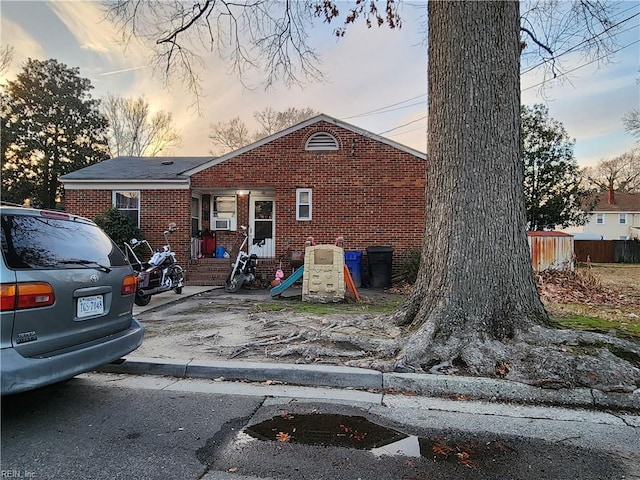 view of front of home with cooling unit