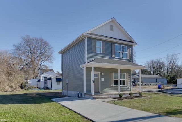 view of front of house featuring a front yard and a porch