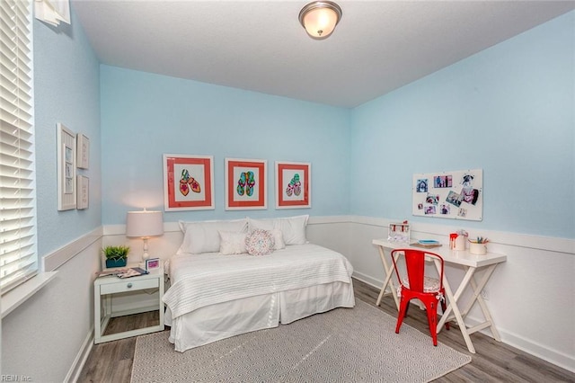 bedroom featuring hardwood / wood-style flooring