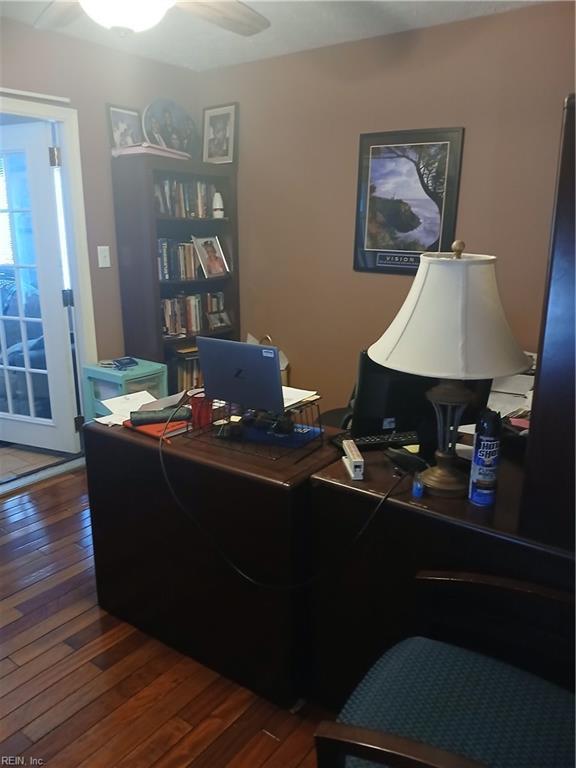 office area with dark hardwood / wood-style flooring