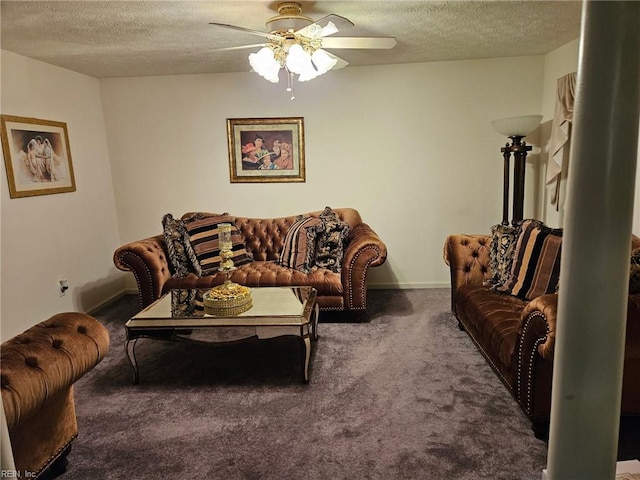 carpeted living room with a textured ceiling and ceiling fan