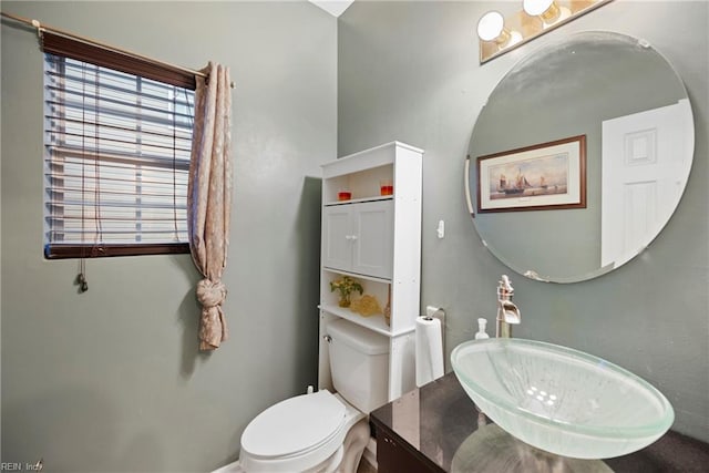 bathroom featuring sink and toilet