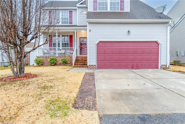 view of front property with a porch, a garage, and a front yard