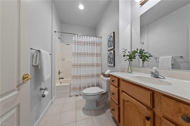 full bathroom featuring tile patterned floors, toilet, shower / bath combo with shower curtain, and vanity