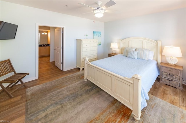 bedroom featuring hardwood / wood-style flooring and ceiling fan