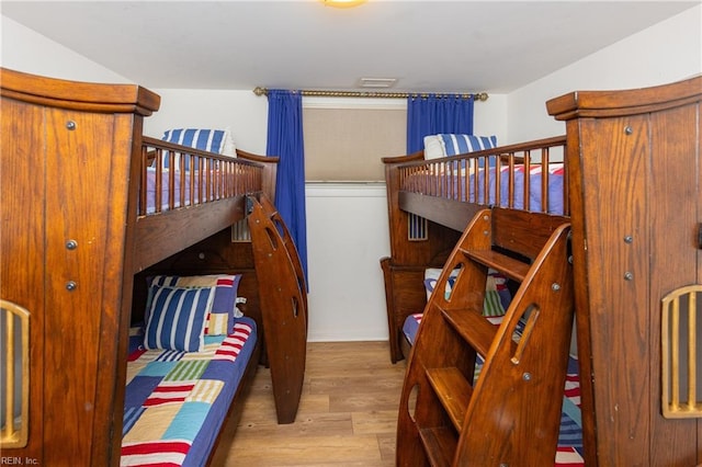 bedroom with light wood-type flooring